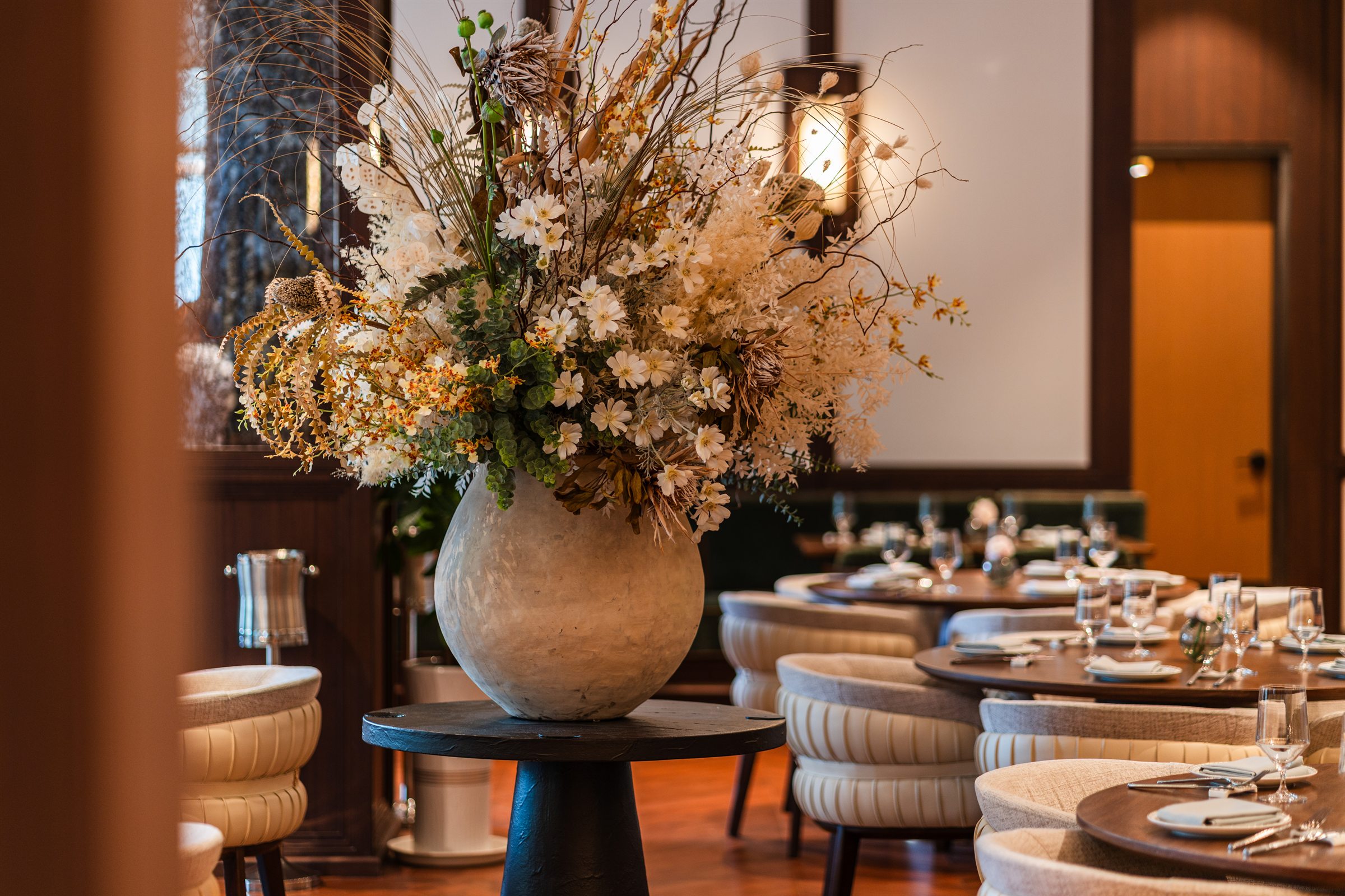Floral arrangement inside a MŌLI dining room
